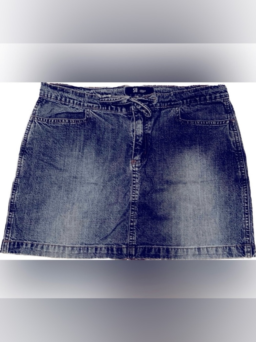Stylish SO faded mini denim skirt with drawstring waist. Juniors size 13
